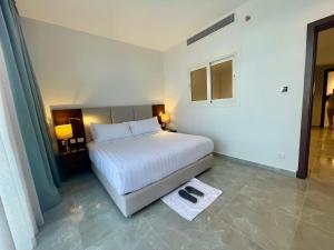 Postel nebo postele na pokoji v ubytování Porto Sokhna Beach Resort