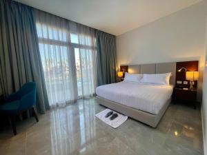 Postel nebo postele na pokoji v ubytování Porto Sokhna Beach Resort
