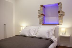 Postel nebo postele na pokoji v ubytování Rooms Supreme Spalato