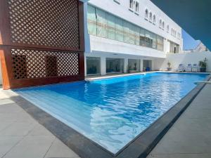 Bazén v ubytování Porto Sokhna Beach Resort nebo v jeho okolí