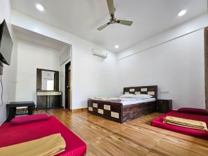 Letto o letti in una camera di Oxygen Resort, Akshi