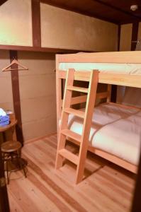 Voodi või voodid majutusasutuse 篠山城下町ゲストハウス inosica toas