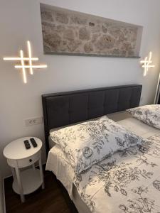 Ein Bett oder Betten in einem Zimmer der Unterkunft Apartment Batinica