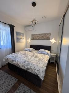 Ein Bett oder Betten in einem Zimmer der Unterkunft Apartment Batinica