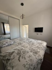 Ein Bett oder Betten in einem Zimmer der Unterkunft Apartment Batinica