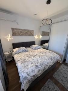 Ein Bett oder Betten in einem Zimmer der Unterkunft Apartment Batinica