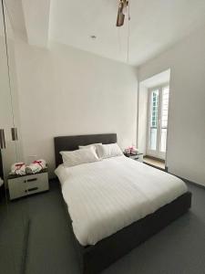 En eller flere senge i et værelse på Nuovo appartamento - Casa D'Amaldi + 10 billeder