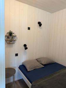 Una cama o camas en una habitación de Aitvarai 41 146 fotos más