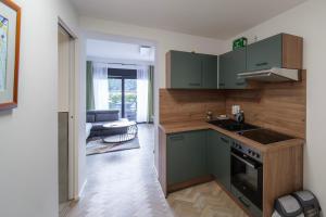 Η κουζίνα ή μικρή κουζίνα στο Moderne Masionette Wohnung