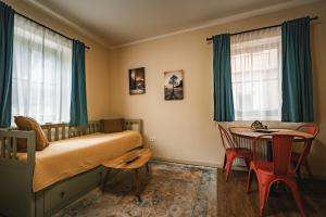 Postel nebo postele na pokoji v ubytování Guest House EJGA