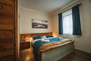 Postel nebo postele na pokoji v ubytování Guest House EJGA