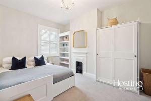 Voodi või voodid majutusasutuse Sapphire House - Newly Renovated 3-Bedroom Home toas