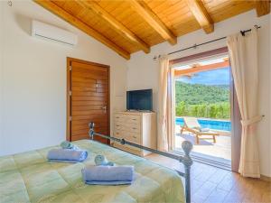 TV a/nebo společenská místnost v ubytování Sardinia Family Villas - Anita & Chanel with private pool