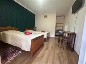 Letto o letti in una camera di Hotel-GVALA
