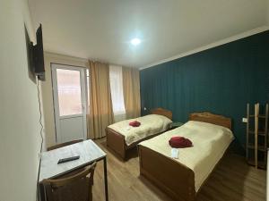 Letto o letti in una camera di Hotel-GVALA