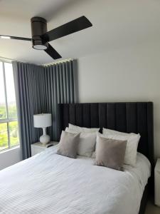 Katil atau katil-katil dalam bilik di Cozy apartment in Cali