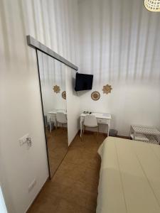 Μια τηλεόραση ή/και κέντρο ψυχαγωγίας στο A Casa Di Coso B&B