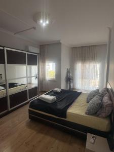 Ένα ή περισσότερα κρεβάτια σε δωμάτιο στο Antalya Apart +129 φωτογραφίες