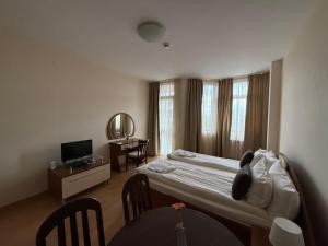 Μια τηλεόραση ή/και κέντρο ψυχαγωγίας στο PM Services Flora Apartments