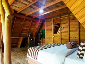 Postel nebo postele na pokoji v ubytování Eco Village