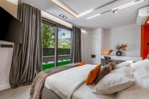 Krevet ili kreveti u jedinici u objektu Alba Garden