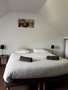 Postel nebo postele na pokoji v ubytování Cottage 102