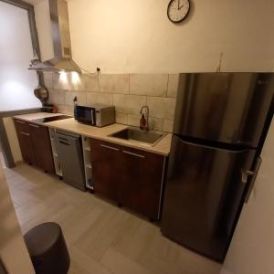 Kuchyňa alebo kuchynka v ubytovaní Apartman Nadia Seaview