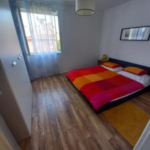 Posteľ alebo postele v izbe v ubytovaní Apartman Nadia Seaview