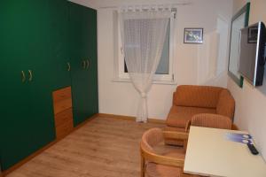 Posezení v ubytování Hotel Mondschein