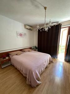 Posteľ alebo postele v izbe v ubytovaní Apartment House Aria