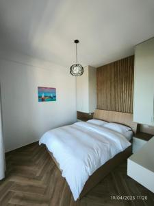 Ένα ή περισσότερα κρεβάτια σε δωμάτιο στο Artemis Beach House +122 φωτογραφίες