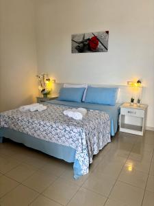 Ένα ή περισσότερα κρεβάτια σε δωμάτιο στο Agriturismo Antico Vigneto