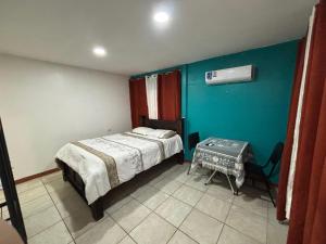 Postel nebo postele na pokoji v ubytování Apartamentos Zamora