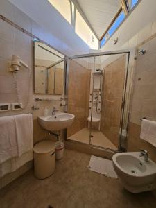 Koupelna v ubytování Albergo Nyers