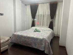 Postel nebo postele na pokoji v ubytování Apartamento en Pasto, cerca a lugares importantes de la ciudad