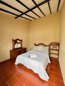 Postel nebo postele na pokoji v ubytování Hotel el laberinto