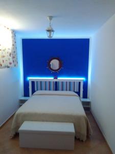 A bed or beds in a room at Casarizzo
