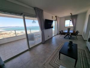 TV a/nebo společenská místnost v ubytování Albi Boutique Apartments