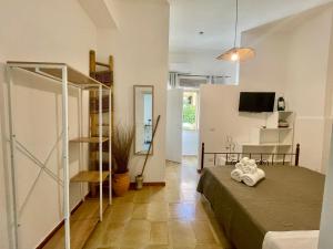 Ένα ή περισσότερα κρεβάτια σε δωμάτιο στο La casa di nonna