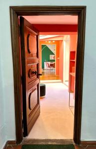 an open door into a room with a living room at Prestige and comfort in the center of Perugia and views in Perugia