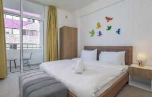 Postel nebo postele na pokoji v ubytování Hostland