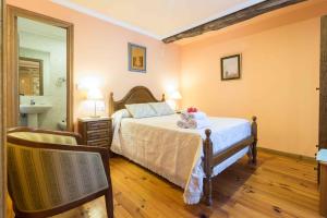 Posteľ alebo postele v izbe v ubytovaní Casa Da Urcela