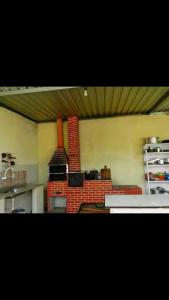 Dapur atau dapur kecil di Chácara dos Sonhos