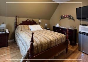 Le Gîte De La Sagouine客房内的一张或多张床位