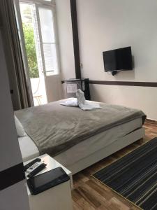 Voodi või voodid majutusasutuse Hotel velvet One toas