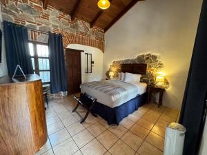 Voodi või voodid majutusasutuse Hotel Cacique Real toas