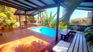 The swimming pool at or close to Cedar Retreat Cottage