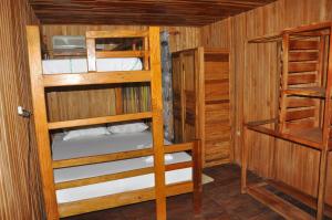 Palanda nebo palandy na pokoji v ubytování Appartement Chalet Kribi