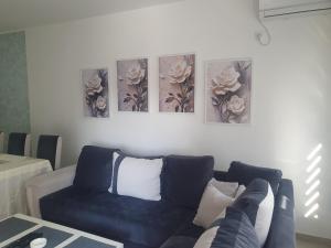 Posezení v ubytování Lux trosoban