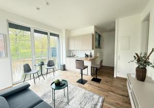 Kuchyň nebo kuchyňský kout v ubytování Hermitage Apartment mit Seeblick und Seezugang